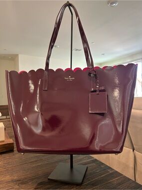 kate spade glossy leather scalloped tote in wine